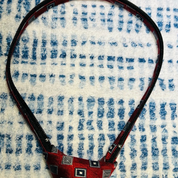 Child’s Tie-zipper adjustable, one size, approximately 14”, Dillards Class Club - Picture 3 of 5